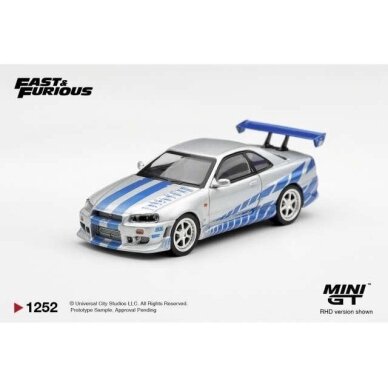 PRE-ORDER Mini GT Modeliukas 1/64 2003 Nissan Skyline GT-R (R34) C-West *2 Fast 2 Furious* Brian O’Conner, silver/blue