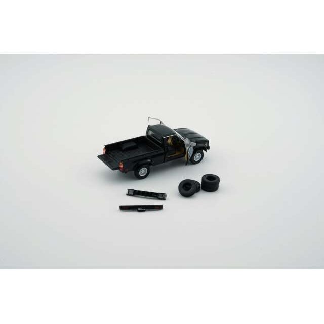 PRE-ORD3R BM Creations Toyota Hilux, black left hand drive with extra set of wheels and bumpers.